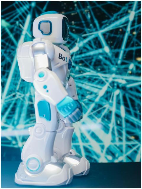 A futuristic robot with a digital network backgrou
