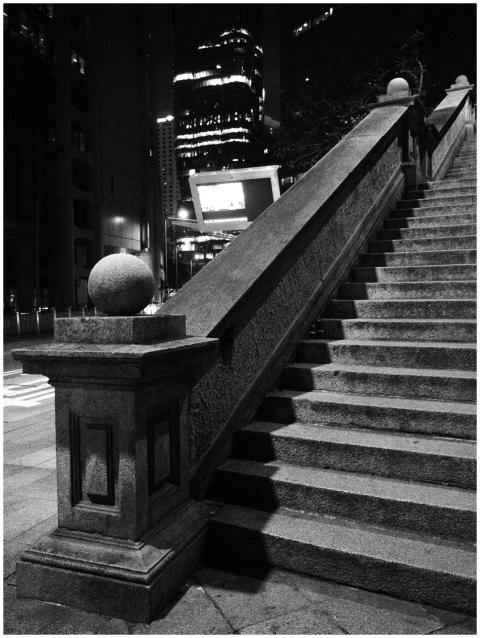 Elegant black and white photo of a stone staircase