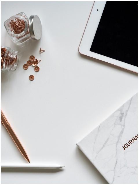 A stylish workspace featuring rose gold office sup