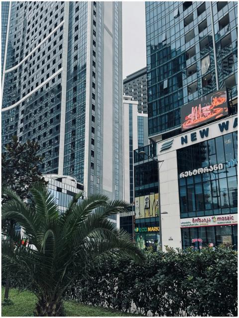 View of tall modern skyscrapers in an urban citysc
