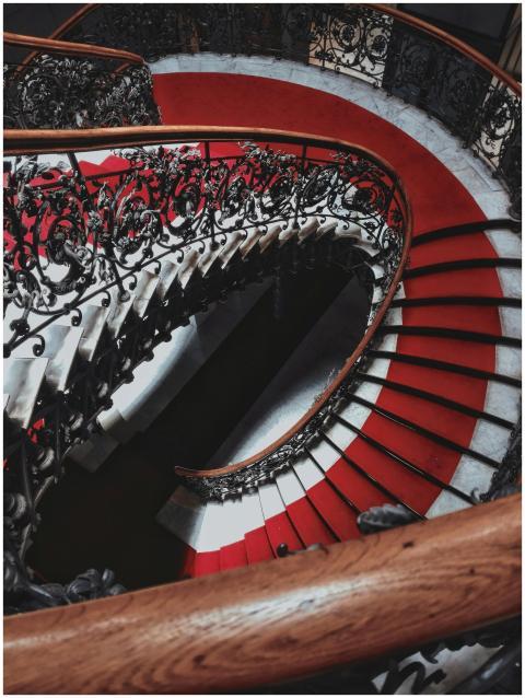 A stunning spiral staircase with intricate wrought