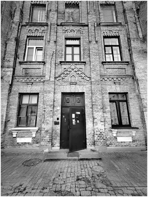 Close-up of a historic brick building facade with