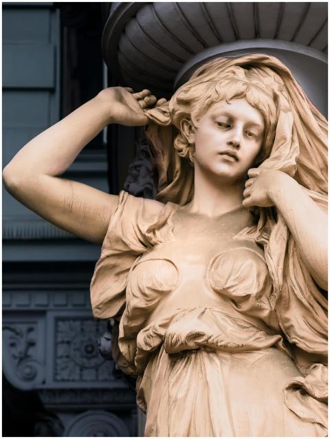 Close-up view of an intricate stone sculpture depi