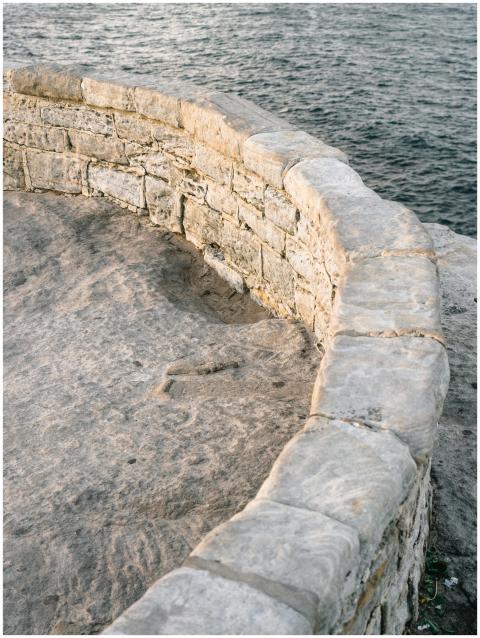 Curved stone wall with ocean view at Bondi Beach,