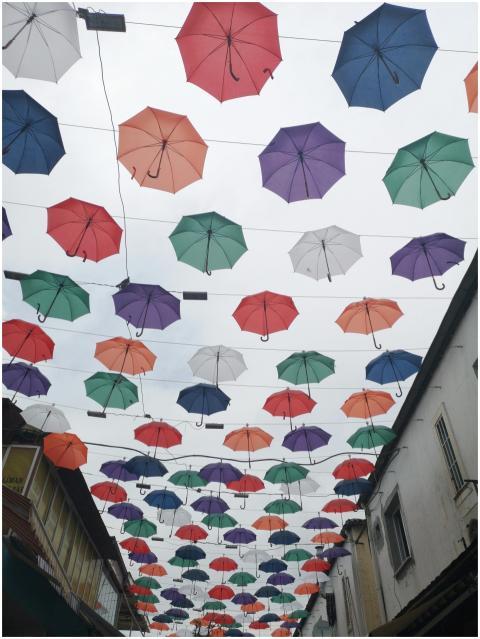 Vibrant street decor with hanging umbrellas in Ant