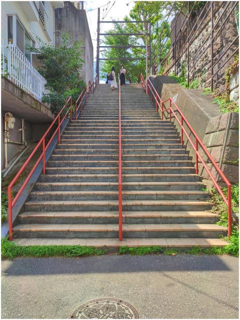 Explore a classic Tokyo stairway with red railings