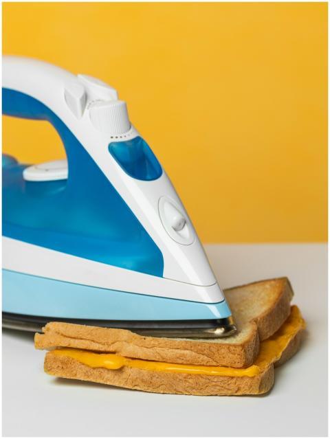A fun concept of using an iron to make a grilled c