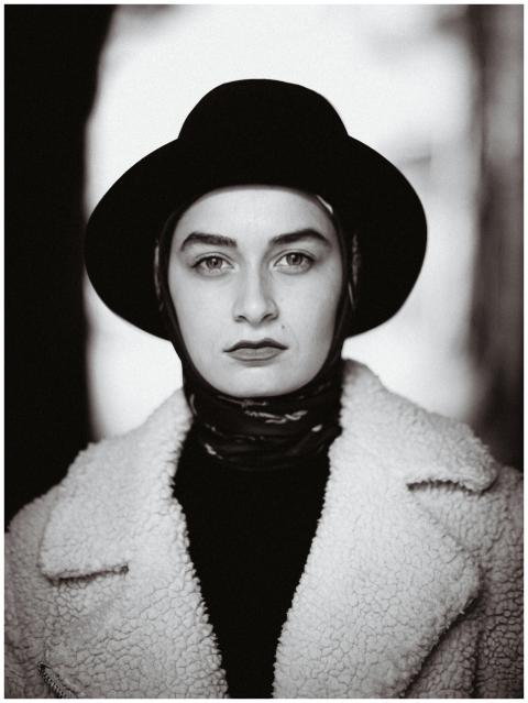 Elegant black and white portrait of a woman in vin