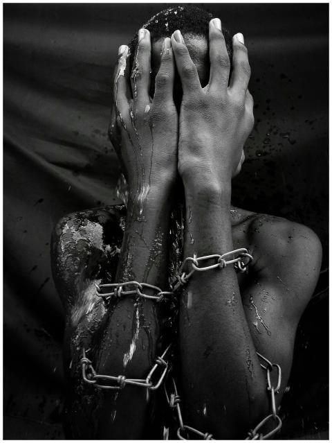 Striking black and white image of a person in chai