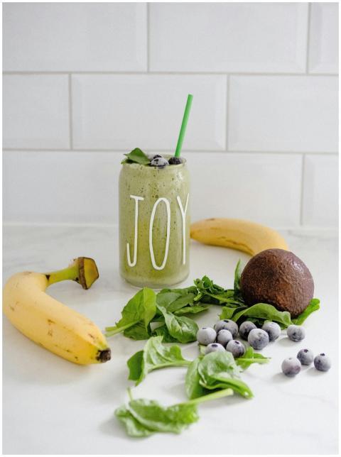 Delicious green smoothie with bananas, blueberries