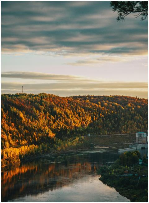 Stunning panoramic view of autumn forest and river