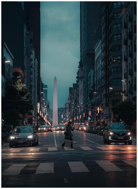 Dramatic night view of Buenos Aires city street, s