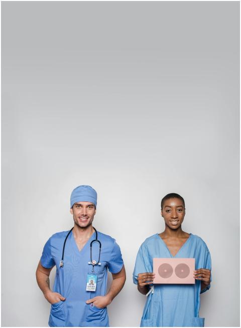 Two medical professionals promoting breast cancer