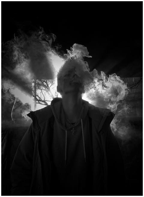 A striking monochrome portrait capturing a person