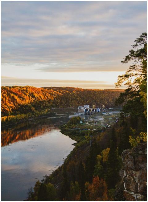 Beautiful autumn landscape with river and forest r