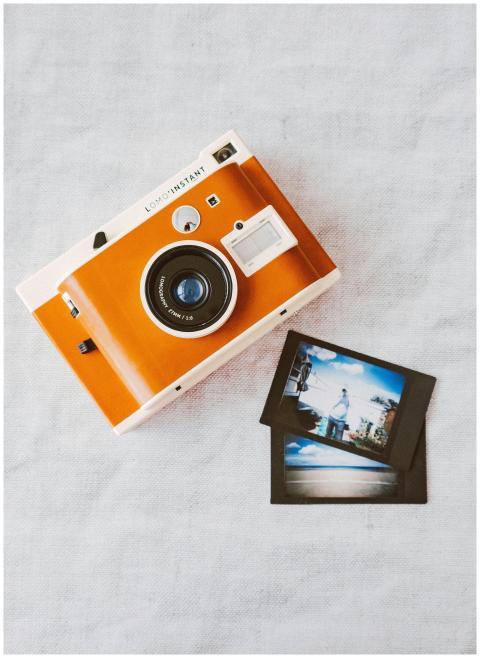 Top view of a vintage instant camera with develope