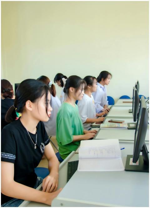 Students working at computers in a university clas