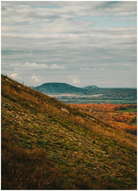 Stunning autumn view of hills and mountains in Bas