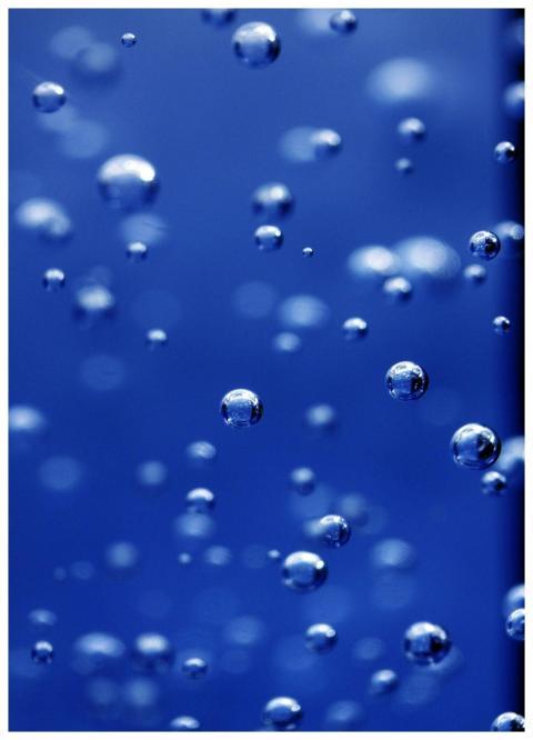 Captivating image of water bubbles in vibrant blue