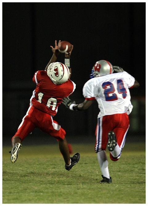 Dynamic shot of two football players in action dur