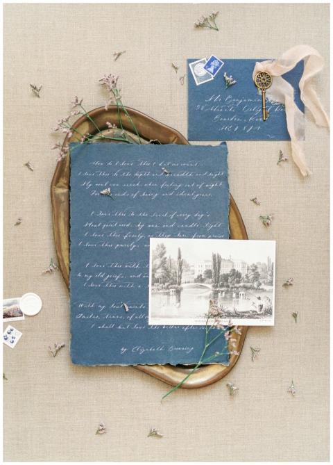 Blue handwritten letter with vintage photo and ant