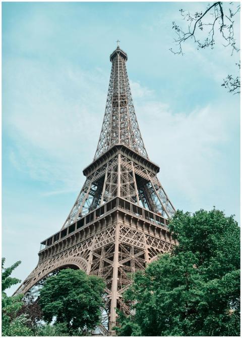 Eiffel Tower reaching into the sky, surrounded by