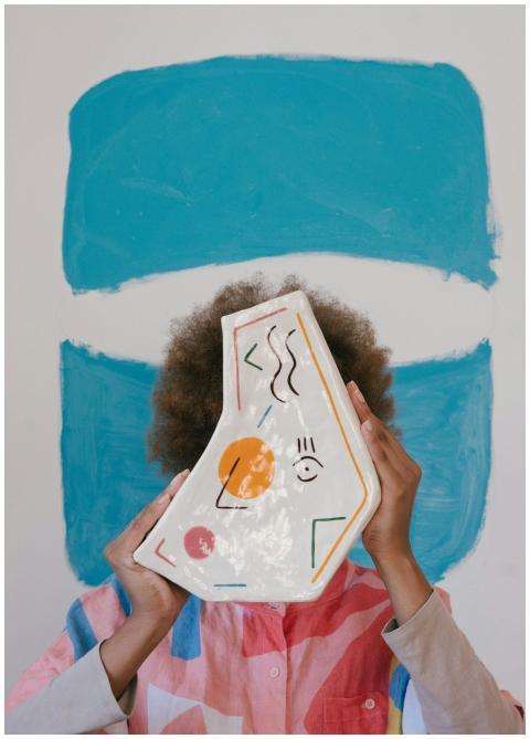 African American female craftswoman in colorful tr