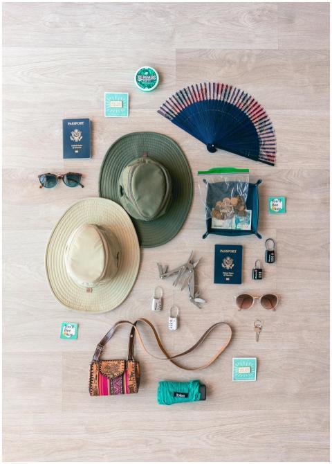 Flat lay of travel essentials including passports,