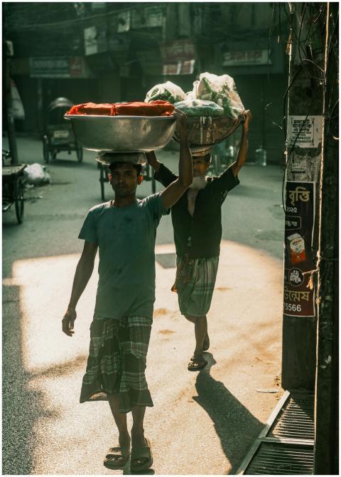 Street Vendors Carrying Goods