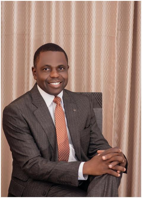 Portrait of a smiling businessman in a suit and ti