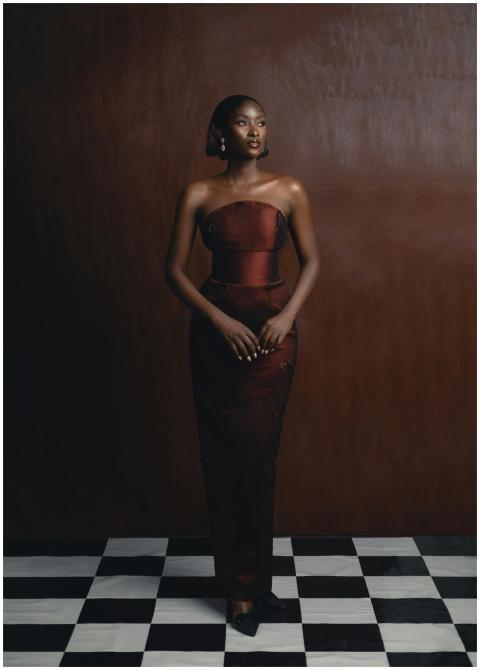 A stunning portrait of a woman in traditional Nige