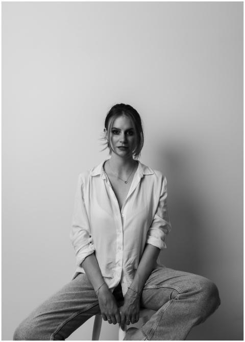 Artistic black and white portrait of a confident i