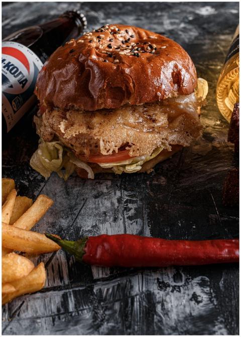 From above appetizing beef burger and french fries