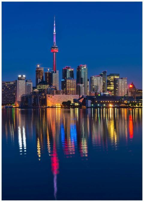 Beautiful nighttime view of Toronto skyline and CN