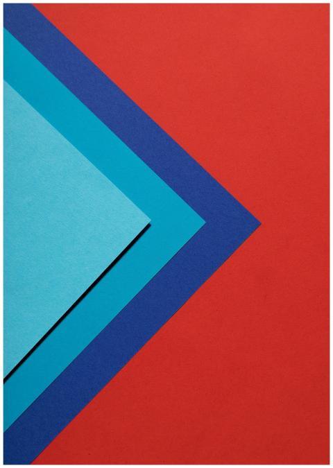 Colorful paper layers in a geometric abstract patt