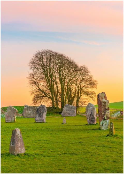 Serene sunset view of Avebury stone circle with vi