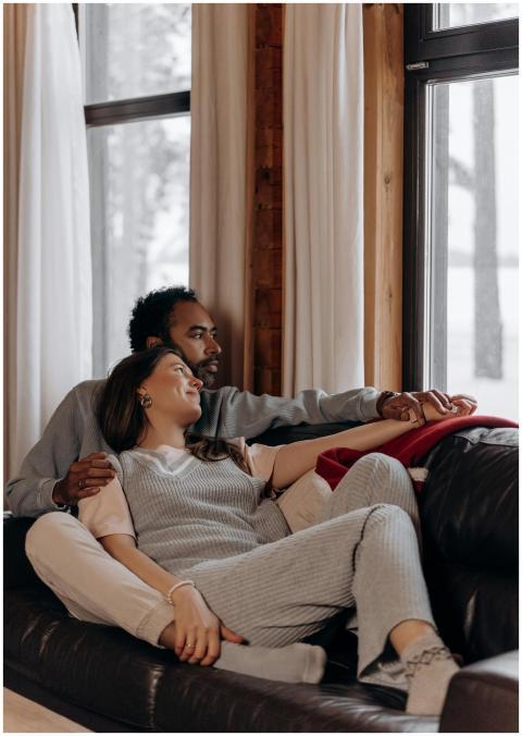 A couple enjoying a cozy moment together indoors d