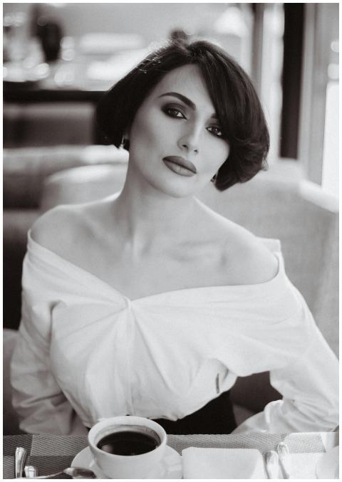 Sophisticated black and white portrait of a woman