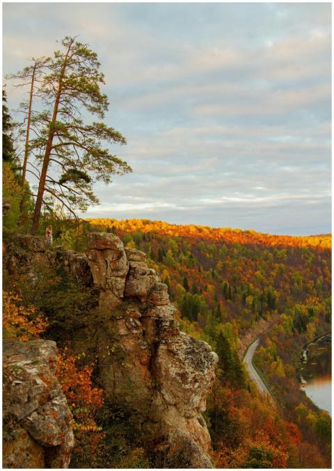 Scenic autumn landscape with cliffs and vibrant co