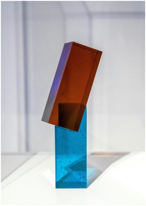 Minimalist glass sculpture with intersecting forms