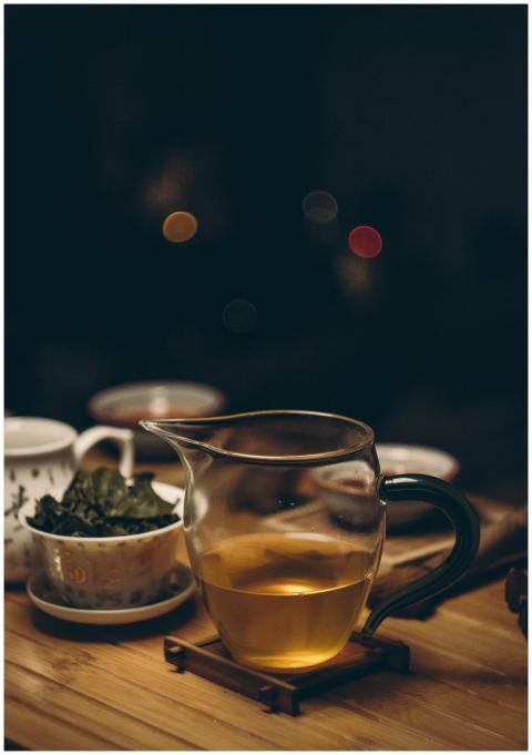 A warm, inviting tea setup on a wooden table, capt