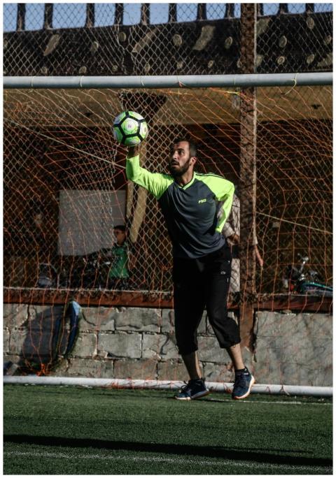 Goalkeeper in a thrilling soccer match save on an