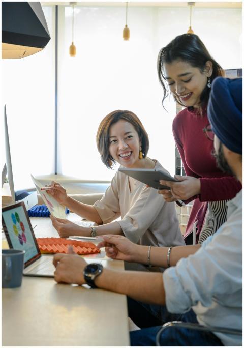 A diverse group of coworkers engaging in a creativ