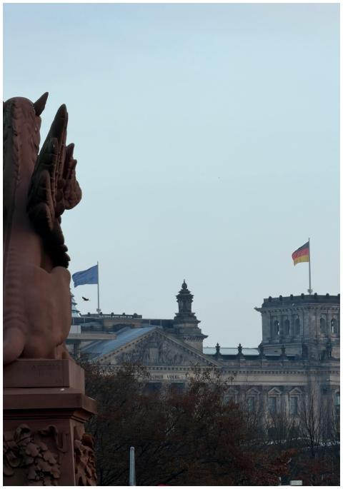 View of the historical Reichstag in Berlin with fl