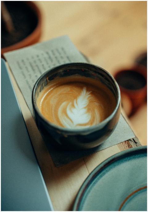 A beautifully crafted latte with latte art in a ru