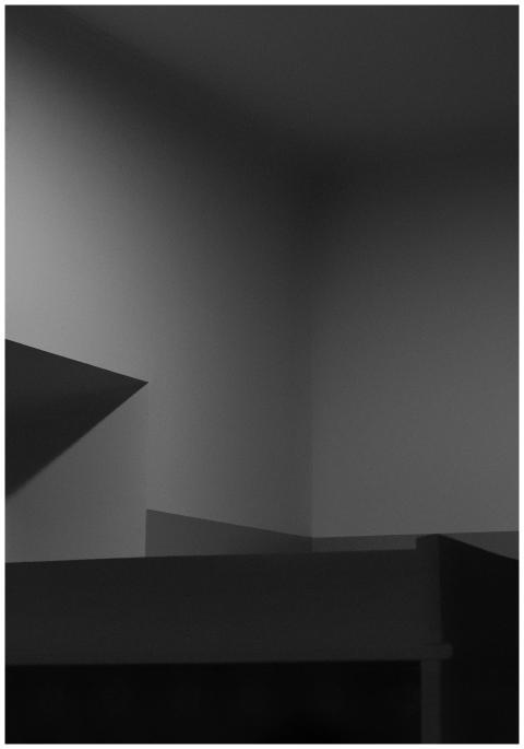 A minimalist black and white photo highlighting ar