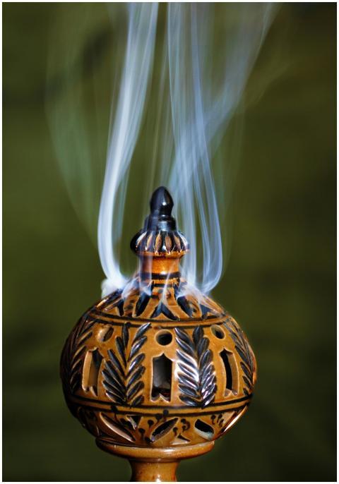 Elegant ceramic incense burner with intricate desi