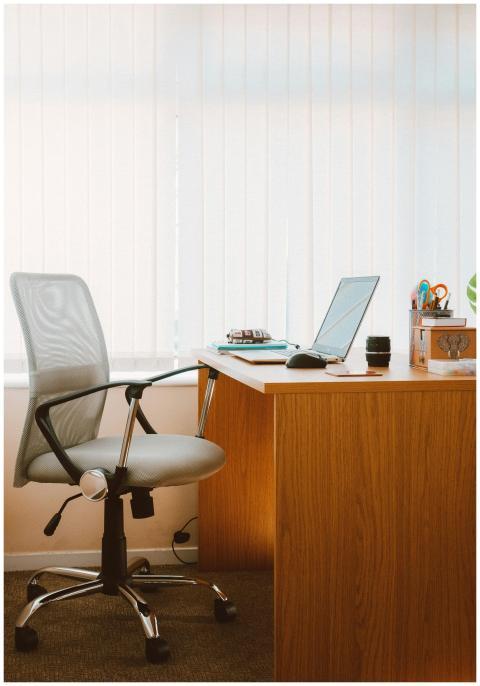 A tranquil modern home office featuring a wooden d