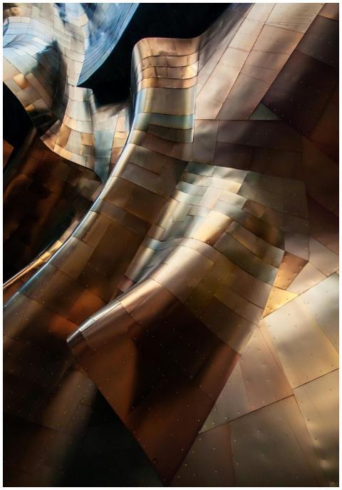 Abstract metal architecture with flowing curves an