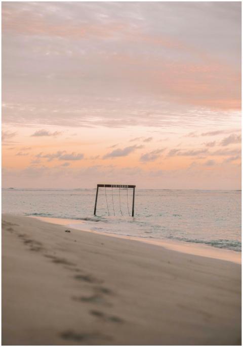 A tranquil beach scene in the Maldives featuring a